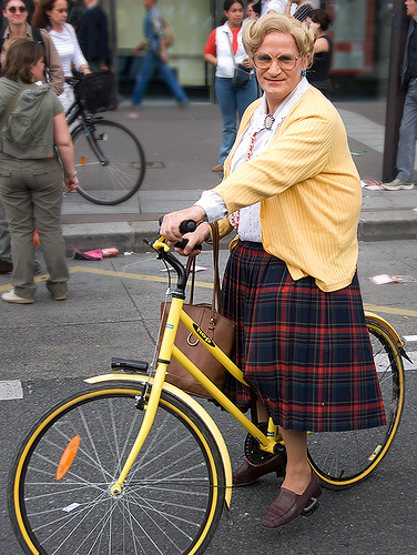 Mrs. Doubtfire look alike on a bike