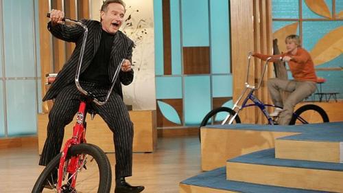 Robin bikes with Ellen